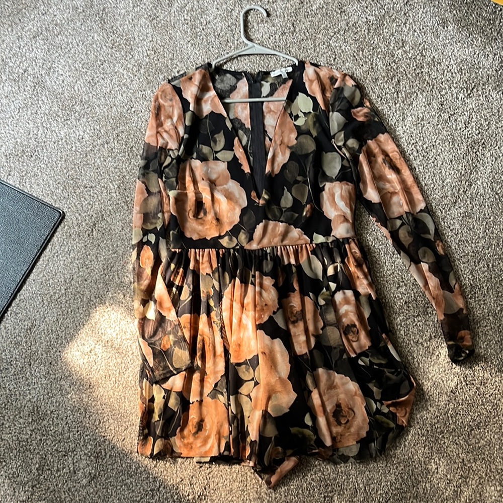 Black & nude floral romper. Size LG.